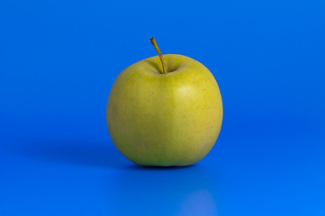 green apple and measurement tape