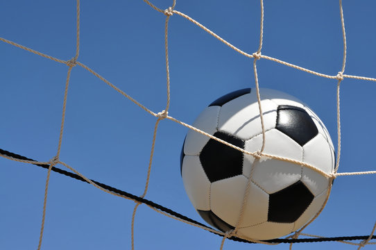 Closeup of Soccer Ball in Goal