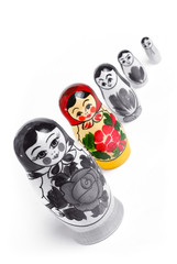 Matrioshka doll stand out from the crowd. individuality concept