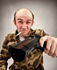 Impudent bandit with gun