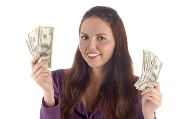 Funny female with two piles of dollars (isolated)