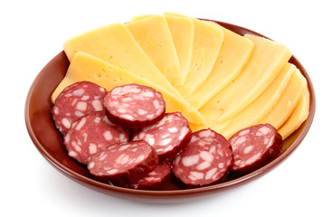 Sausage and cheese on plate isolated on white