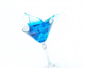 Blue splash in a glass