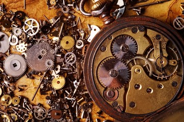 The old gears on the textured paper