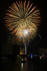 Yellow firework over Chaophraya river Bangkok on Father's day,Ba