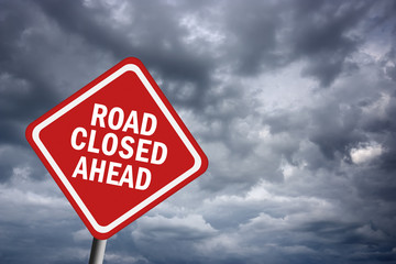 Road closed ahead sign