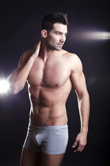 Closeup of a muscular handsome man in underwear - 30892346
