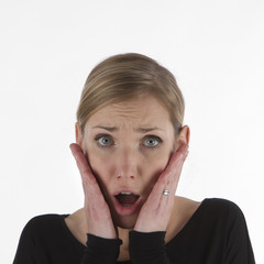 Beautiful young woman is in shock