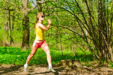 young woman running in park
