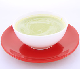 Pea and mozzarella soup in a bowl