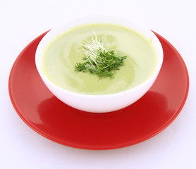 Pea and mozzarella soup decorated with some cress