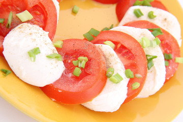 Caprese salad - tomatoes, mozzarella and parsley