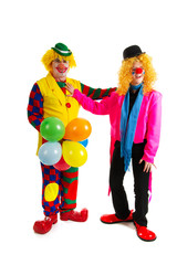 Funny clowns with balloons