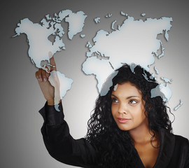 positive African American businesswoman and map of the world.