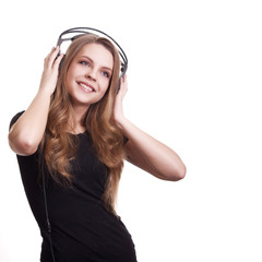 attractive smiling woman with headphones on white background