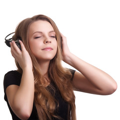 attractive smiling woman with headphones on white background