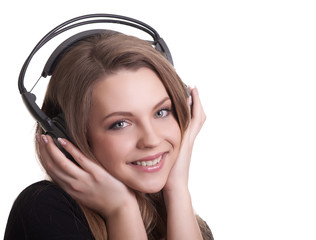 attractive smiling woman with headphones on white background