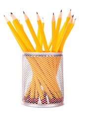 Pencils in support isolated on white