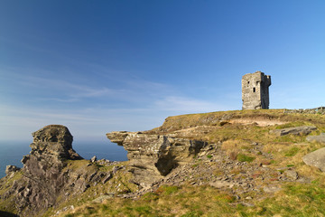 Fototapeta na wymiar Ruins of old castle on Cliffs of Moher - Ireland