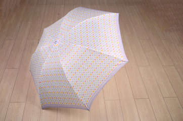 A automatic folder umbrella on floor