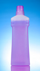 Pink bottle on blue background