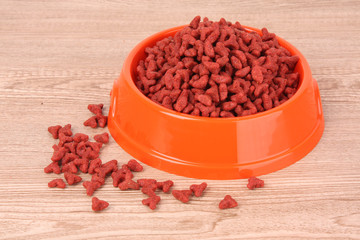 Cats food on wooden table