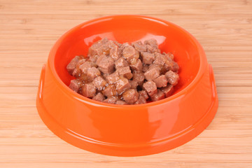 Cats food on wooden table
