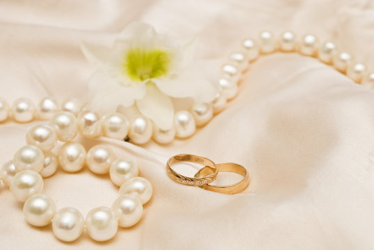 wedding rings and orchid