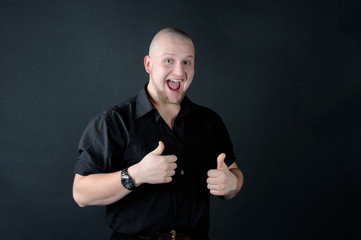 Happy man showing thumbs up