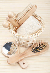 Fototapeta na wymiar bath accessories on the bamboo mat