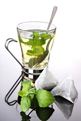 Herbal tea with pyramid teabags and mint