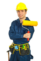 Happy worker man holding paint roller