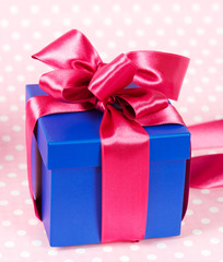 gift box with pink ribbon