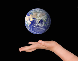 Hand with planet earth