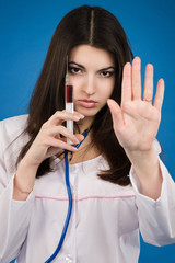 Naklejka premium Nurse with a disposable syringe