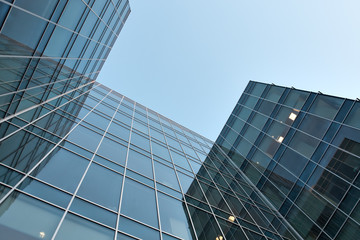 Fototapeta na wymiar modern glass skyscraper perspective view