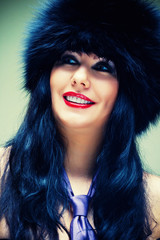 Fototapeta premium Woman in fur cap