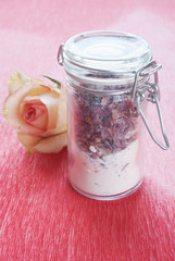 Dried rose petals in a jar