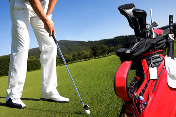 Man playing golf