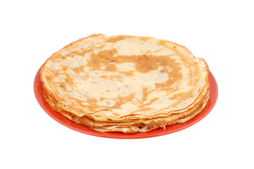 Pancakes on red plate, isolated on white background