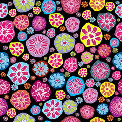 Naklejka premium Seamless pattern with colored flowers on black background