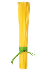 Bunch of spaghetti tied up with green ribbon isolated on white