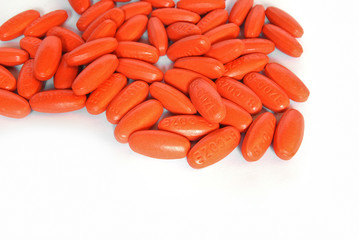 orange vitamin medicine pills closeup