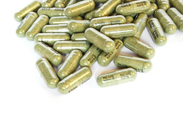 green herbal medicine capsule