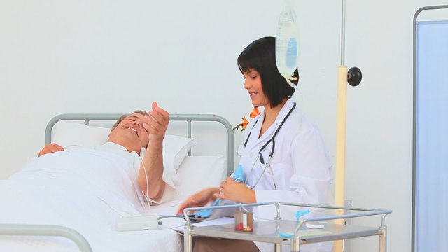Nurse examining her patient