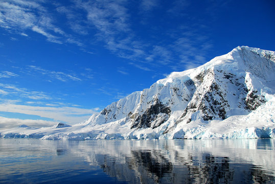 view of antarctic landscape, sunny skies