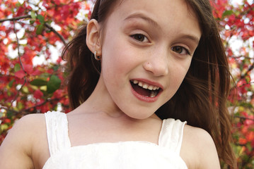 Young girl at the park in spring