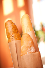 Three fresh baguettes on the table