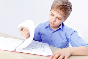 Clever boy doing homework