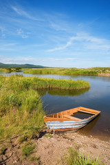 Obraz premium Old boat from a wood
